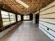 Spacious living room with three windows and tile flooring partially under construction at 378 79Th Ne Ave, St Petersburg, FL 33702