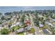 Aerial view of neighborhood near waterfront with house indicated by red arrow at 3843 Neptune Se Dr, St Petersburg, FL 33705
