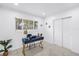 Office space with desk, neutral carpet, and natural light from the window at 3843 Neptune Se Dr, St Petersburg, FL 33705