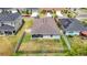 An attractive home's backyard is fenced with a cozy covered patio area and is conveniently located in a neighborhood at 3891 Reflection Dock Dr, Seffner, FL 33584