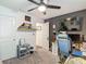 Bedroom featuring a desk, a ceiling fan, and decor at 3891 Reflection Dock Dr, Seffner, FL 33584