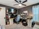 Bedroom featuring a desk, a ceiling fan, and decor at 3891 Reflection Dock Dr, Seffner, FL 33584