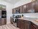 Gourmet kitchen boasts granite countertops, stainless steel appliances, and ample storage space at 3891 Reflection Dock Dr, Seffner, FL 33584