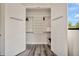 Organized walk-in closet with ample shelving and hanging space at 4047 Gauge Line Loop, Tampa, FL 33624