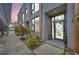 Elegant townhouse entrance with decorative wreath and contemporary exterior at 4047 Gauge Line Loop, Tampa, FL 33624