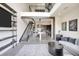 Spacious living room with soaring ceilings, modern decor, and an open-concept design at 4047 Gauge Line Loop, Tampa, FL 33624