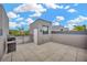 Wide angle of the patio with grill, tile flooring, and outdoor space for entertaining at 4047 Gauge Line Loop, Tampa, FL 33624