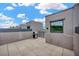 Spacious outdoor patio featuring tile flooring and a built in grill at 4047 Gauge Line Loop, Tampa, FL 33624