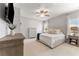 Bedroom with neutral decor, ceiling fan, and a comfortable bed at 412 S Albany Ave # 2, Tampa, FL 33606