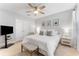 This bedroom features a neutral color palette and a cozy bed at 412 S Albany Ave # 2, Tampa, FL 33606