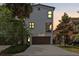 Charming home featuring a spacious garage, balcony, and meticulously maintained front yard offering a serene and inviting curb appeal at 412 S Albany Ave # 2, Tampa, FL 33606