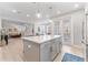 Open kitchen with large kitchen island, stainless steel appliances, and natural lighting at 412 S Albany Ave # 2, Tampa, FL 33606