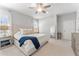 Bright and airy main bedroom with a large bed, soft lighting, and stylish furniture, offering a peaceful and comfortable ambiance at 412 S Albany Ave # 2, Tampa, FL 33606