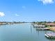 Picturesque canal view showcasing multiple docks and boats, offering serene waterfront living and easy boat access at 440 115Th Ave, Treasure Island, FL 33706