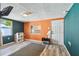 Spacious basement featuring hardwood floors, ample lighting, and tons of room for entertainment at 4501 50Th N Ave, St Petersburg, FL 33714