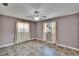 Bedroom featuring tile floors and light filtering window treatments and a ceiling fan at 508 E Brentridge, Brandon, FL 33511
