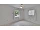 Bright bedroom with updated ceiling fan and white trim at 508 E Brentridge, Brandon, FL 33511