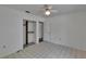 Bedroom featuring a ceiling fan and a closet with a clothing rack at 508 E Brentridge, Brandon, FL 33511