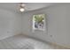 Bright bedroom with tiled flooring and large window at 508 E Brentridge, Brandon, FL 33511