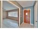 Inviting entryway transitioning to a bright living space with tile flooring and a convenient coat closet at 508 E Brentridge, Brandon, FL 33511