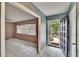 Open entryway leading to a bright living area, featuring tile floors and natural light at 508 E Brentridge, Brandon, FL 33511