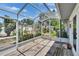 Screened-in patio with concrete flooring surrounded by backyard landscape at 508 E Brentridge, Brandon, FL 33511