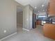 Spacious kitchen layout with seamless transition to adjacent rooms, ideal for entertaining guests at 5636 Whitehead St, Bradenton, FL 34203