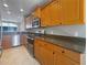Modern kitchen showcasing granite countertops, stainless steel appliances, and ample cabinet space for storage at 5636 Whitehead St, Bradenton, FL 34203