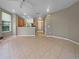 Open-concept living area showcasing a seamless flow between living, dining, and kitchen spaces, perfect for modern living at 5636 Whitehead St, Bradenton, FL 34203
