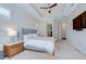 Relaxing main bedroom with neutral color scheme and a view of the en-suite bathroom at 5728 Watercolor Dr, Lithia, FL 33547