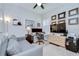 Home office featuring a sofa, a desk with dual monitors, and lots of natural light at 5728 Watercolor Dr, Lithia, FL 33547