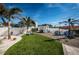 Enjoy the beautiful backyard with well maintained landscaping and lounging area at 650 70Th Ave, St Pete Beach, FL 33706