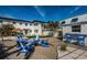 Beautiful backyard with beachy details, lounge chairs and a bar at 650 70Th Ave, St Pete Beach, FL 33706