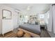 Bright bedroom featuring modern decor, lots of natural light, and ceiling fan at 650 70Th Ave, St Pete Beach, FL 33706