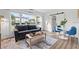 Cozy living room features comfortable seating, dining area, and ample natural light at 650 70Th Ave, St Pete Beach, FL 33706