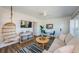Inviting living room with a cozy couch, stylish furnishings, and a relaxing atmosphere at 650 70Th Ave, St Pete Beach, FL 33706