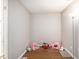 Cozy bedroom with two play tents and plush stuffed animals on the floor at 7004 Lambright Ct, Tampa, FL 33634
