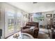 Cozy living room with French doors leading to the backyard, creating a seamless indoor-outdoor flow at 7004 Lambright Ct, Tampa, FL 33634