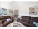 Inviting living room with comfortable seating and a pass-through view of the kitchen at 7004 Lambright Ct, Tampa, FL 33634