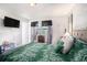 Primary bedroom featuring ample natural light and TV at 7004 Lambright Ct, Tampa, FL 33634