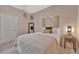 This bedroom has a queen-sized bed, new artwork and a modern-style nightstand at 7010 N Hubert Ave, Tampa, FL 33614