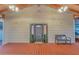 Front porch features craftsman trim, stained wood deck, and seating at 7010 N Hubert Ave, Tampa, FL 33614