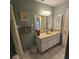 Bathroom features a shower and vanity at 7303 9Th W Ave # 7303, Bradenton, FL 34209