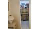 Walk-in closet includes shelving, hanging rods, and room for storage at 7303 9Th W Ave # 7303, Bradenton, FL 34209