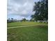 Well maintained community lawn and landscaping with sidewalks for residents to enjoy at 7303 9Th W Ave # 7303, Bradenton, FL 34209