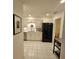 Modern kitchen featuring white cabinets, stainless steel appliances, and lots of countertop space at 7303 9Th W Ave # 7303, Bradenton, FL 34209