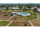 Beautiful community pool with ample seating for residents to enjoy at 7303 9Th W Ave # 7303, Bradenton, FL 34209