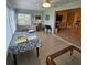 Inviting sunroom featuring tiled flooring and ample natural light, ideal for work and relaxation at 7303 9Th W Ave # 7303, Bradenton, FL 34209