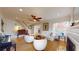 Inviting living room featuring comfortable seating and stairs leading to upper level at 75 Adalia Ave, Tampa, FL 33606