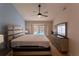 The main bedroom overlooks the pool area at 7838 Trail Run Loop, New Port Richey, FL 34653